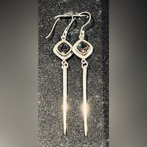 Stunning cosmic dagger Sterling Silver and deep
purple Amethyst Dangle Earrings